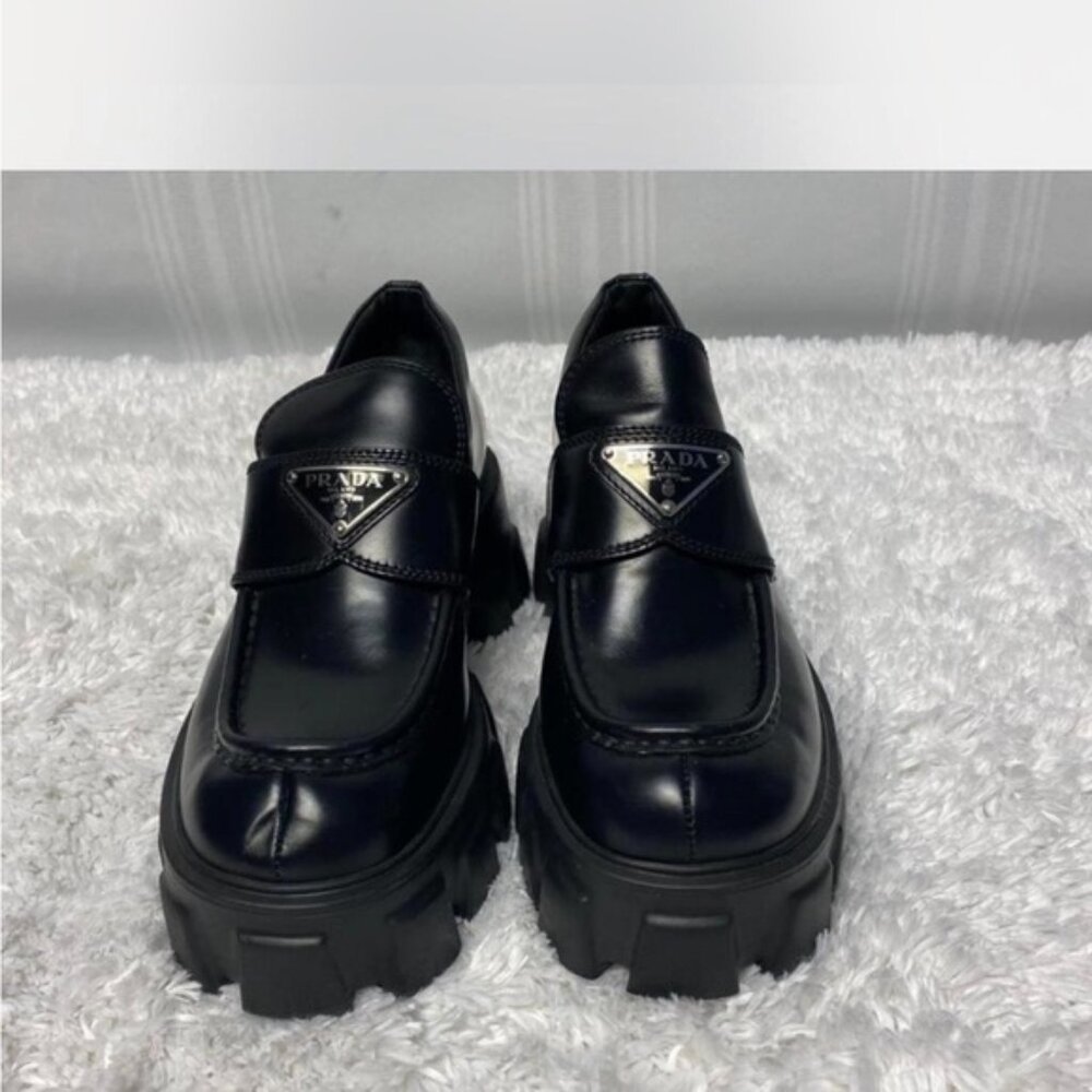 Prada women’s Glossy Black Loafers with Chunky Sole